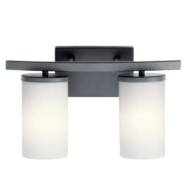 The Crosby vanity light combines transitional styling with practical functionality. Its 15-inch width makes it ideal for standard bathroom vanities, while the satin etched opal glass provides even, flattering light.