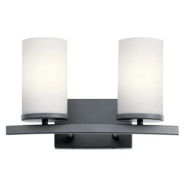 The Crosby vanity light combines transitional styling with practical functionality. Its 15-inch width makes it ideal for standard bathroom vanities, while the satin etched opal glass provides even, flattering light. - alternate view