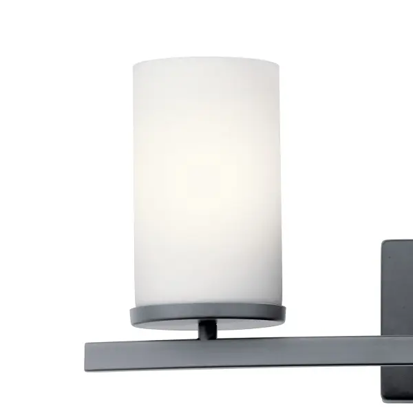 The Crosby vanity light combines transitional styling with practical functionality. Its 23-inch width makes it ideal for medium to large vanities, while satin etched opal glass provides even, flattering illumination. - alternate view