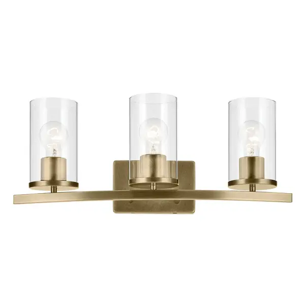 The Crosby 3-Light Vanity Light combines clean lines with warm natural brass and clear glass shades for a sophisticated bathroom lighting solution. Dimmable and damp-rated for versatile installation. - alternate view