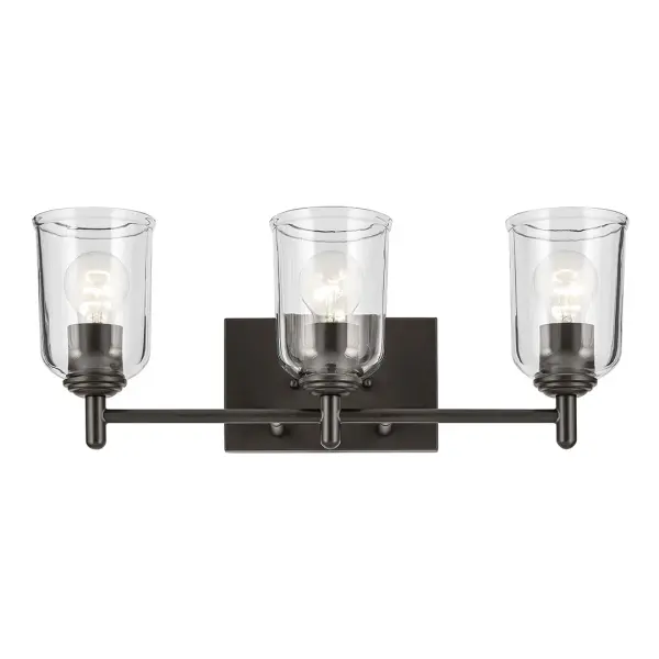 The Shailene 3-Light Vanity Light combines timeless Olde Bronze finish with clear glass shades for a versatile bathroom lighting solution. Its 21-inch width makes it ideal for standard vanities, while dimmable functionality and damp rating ensure practical performance. - alternate view