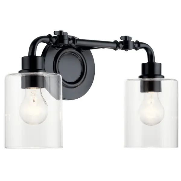 The Gunnison 2-light bath vanity combines traditional styling with practical adjustable hinges that let you direct light exactly where needed. Its exposed hardware and clear glass shades create a classic look perfect for traditional bathrooms.