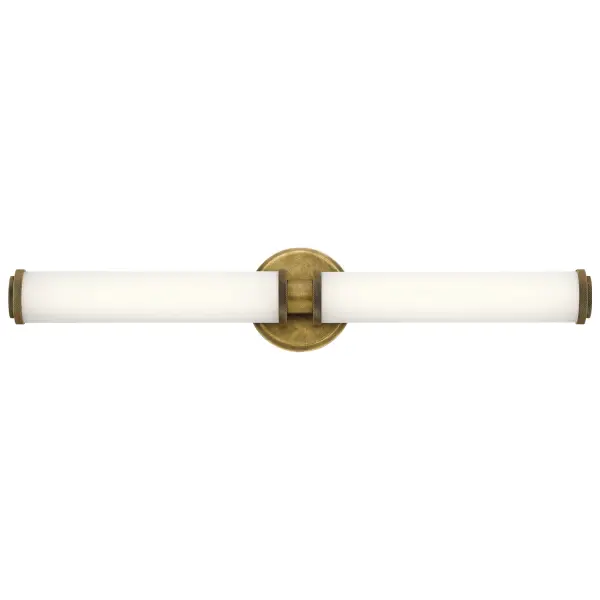 The Indeco combines classic brass warmth with modern LED efficiency. Its distinctive diamond knurl pattern adds textural interest while the satin etched glass provides even, flattering illumination perfect for grooming tasks.