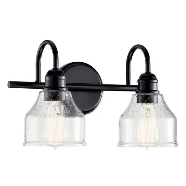 The Avery 2-Light Vanity Light combines rustic farmhouse charm with industrial edge. Its black finish and clear seeded glass shades create visual interest while providing ample illumination for bathroom tasks.