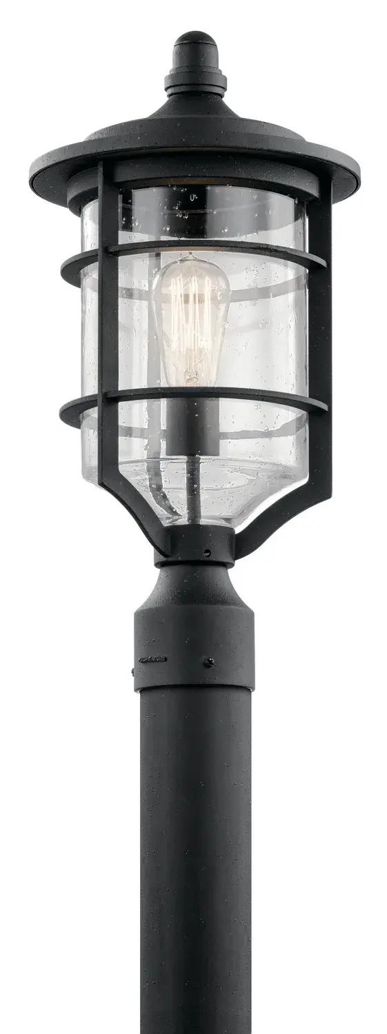 The Royal Marine post mount combines maritime heritage with modern industrial style. Its caged seeded glass and distressed black finish create authentic vintage appeal, while the wet-rated construction ensures durability in any weather.