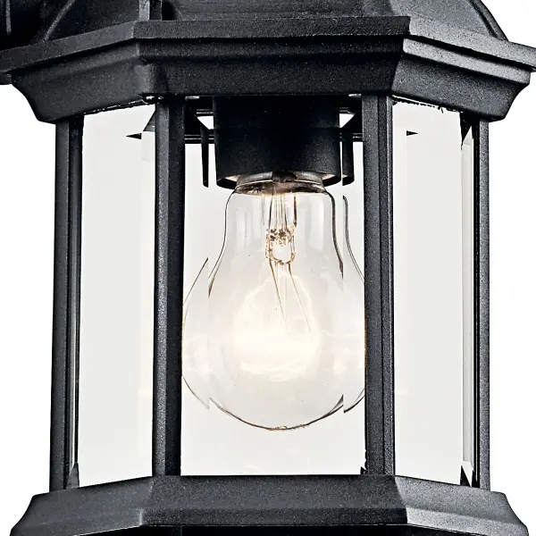 The Barrie outdoor wall light combines traditional styling with practical functionality. Its clear beveled glass and black finish create a versatile look that complements various architectural styles. - alternate view