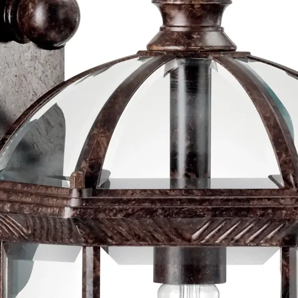 The Barrie Outdoor Wall Light combines traditional styling with durable wet-rated construction. Its clear beveled glass and tannery bronze finish create elegant curb appeal while providing reliable outdoor illumination. - alternate view