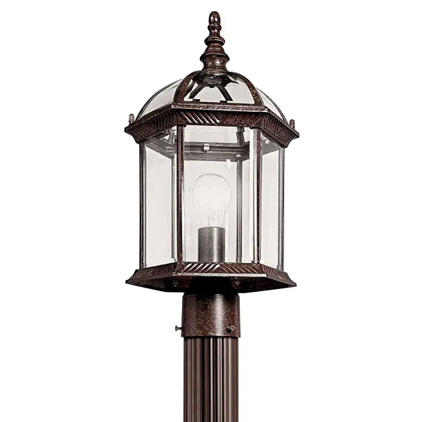 The Barrie Outdoor Post Light combines traditional styling with modern functionality. Featuring clear beveled glass and a rich Tannery Bronze finish, this wet-rated fixture provides reliable illumination for pathways and entryways.