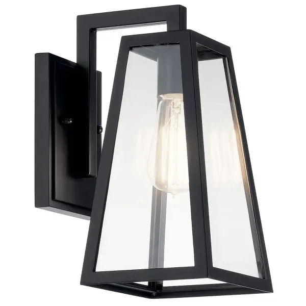 The Delison outdoor wall light combines timeless design with practical functionality. Its clear glass shade and black finish create a versatile look that complements various architectural styles while providing reliable illumination.