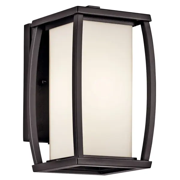 The Bowen Outdoor Wall Light combines traditional craftsmanship with modern durability. Its architectural bronze finish and satin etched glass create warm, welcoming illumination for any outdoor space.