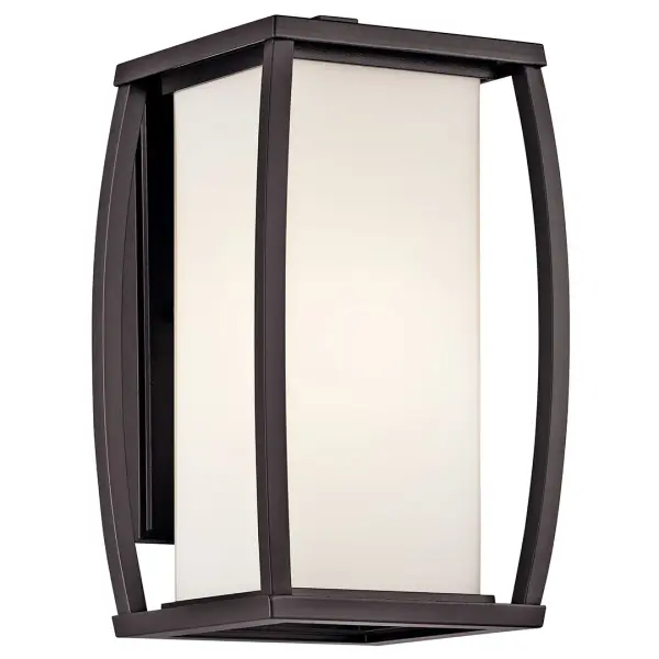 The Bowen Outdoor Wall Light combines traditional craftsmanship with modern durability. Its architectural bronze finish and satin etched glass create warm, welcoming illumination for any outdoor space.