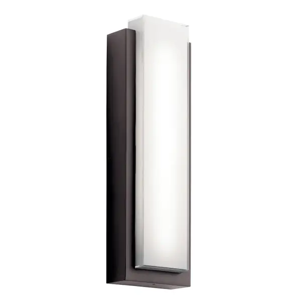 The Dahlia outdoor wall light combines classic design with modern LED technology. Its architectural bronze finish and clear glass with painted white interior create sophisticated illumination for entryways and outdoor spaces.