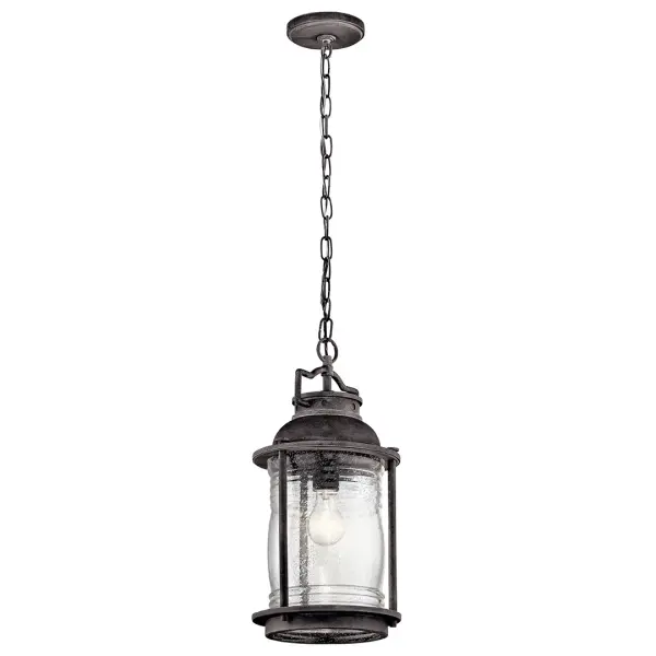The Ashland Bay brings weathered coastal elegance to covered outdoor areas with its zinc finish and seeded glass. At 8.75" wide, it's perfectly scaled for entryways and porches, offering dimmable lighting with damp-rated reliability.