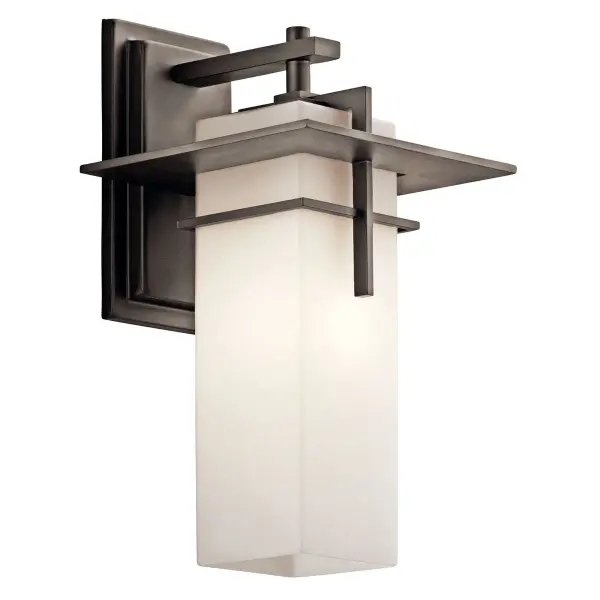 The Caterham outdoor wall light combines traditional styling with modern wet-rated durability. Its Olde Bronze finish and satin etched glass create warm, welcoming illumination for entryways and outdoor living spaces.