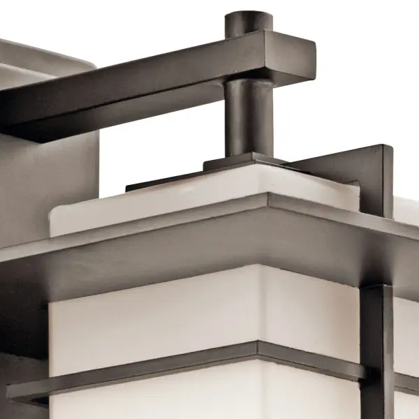 The Caterham outdoor wall light combines traditional styling with modern durability. Its Olde Bronze finish and satin etched glass create warm, welcoming illumination for entryways and outdoor spaces. - alternate view