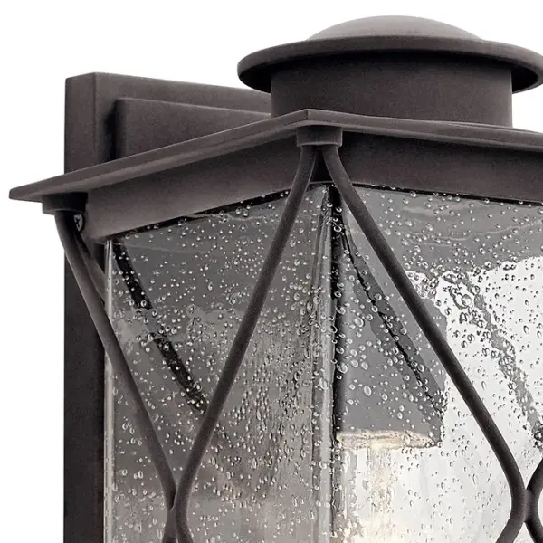The Argyle Outdoor Wall Light combines farmhouse aesthetics with industrial durability. Its weathered zinc finish and clear seeded glass create authentic character while wet-rated construction ensures reliable performance in any weather. - alternate view