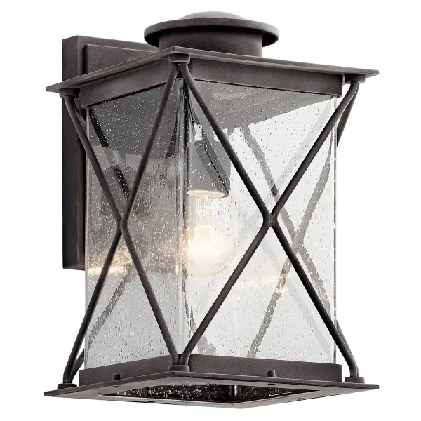 The Argyle outdoor wall light combines traditional styling with durable weathered zinc finish and clear seeded glass. Perfect for coastal and farmhouse exteriors, this compact fixture provides reliable illumination.