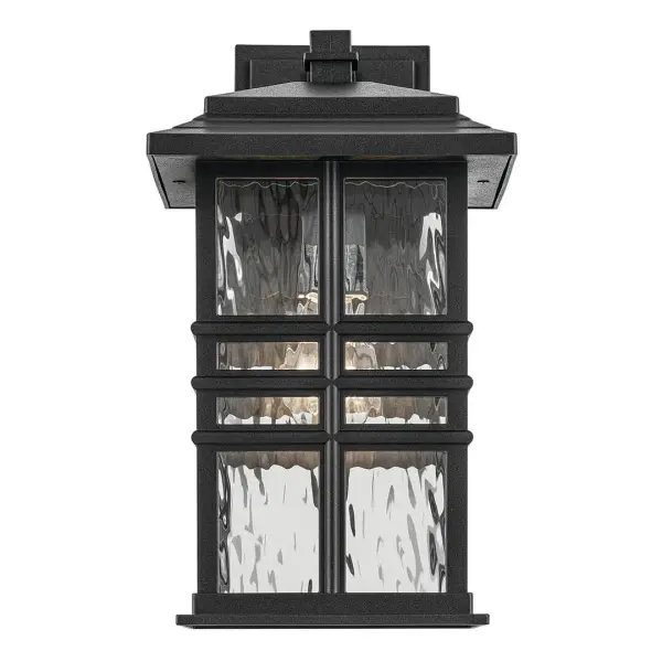 The Beacon Square combines timeless design with durable wet-rated construction. Its textured black finish and clear hammered glass create inviting illumination for entryways and outdoor living spaces. - alternate view