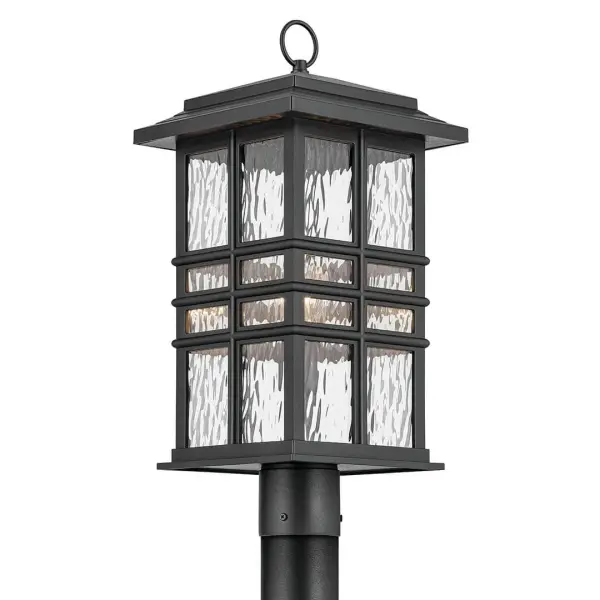 The Beacon Square combines timeless design with modern durability. Its textured black finish and clear hammered glass create beautiful light patterns while standing up to harsh weather conditions.