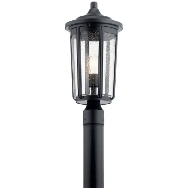 The Fairfield post mount combines timeless lantern styling with weather-resistant aluminum construction. Clear seeded glass adds vintage charm while the wet-rated design ensures reliable performance in all conditions.