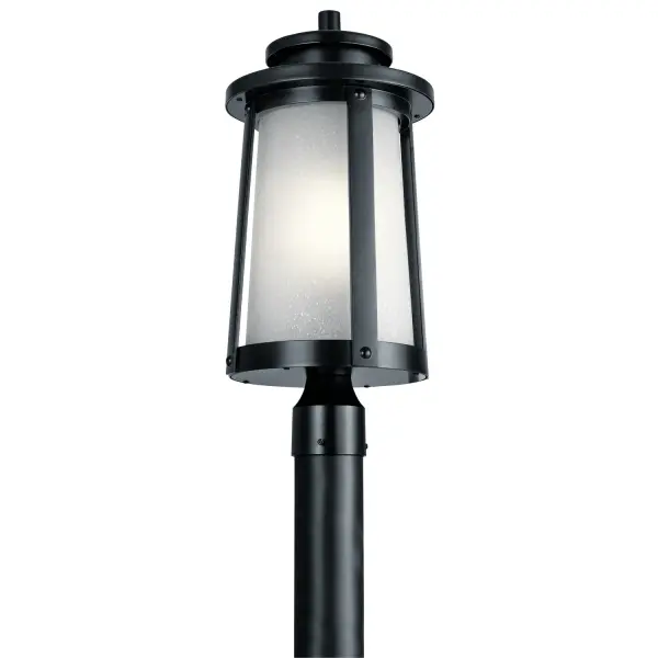 Inspired by historic Chesapeake Bay homes, this outdoor post mount combines vintage charm with modern durability. The black aluminum construction and wet-rated design ensure longevity, while frosted seeded glass creates warm, diffused lighting perfect for welcoming entryways.
