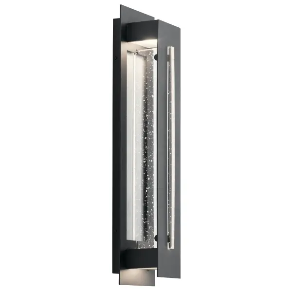 The River Path combines modern aesthetics with practical outdoor performance. Its 23-inch vertical profile and clear seeded glass create dramatic visual interest while integrated LED technology delivers energy-efficient illumination.
