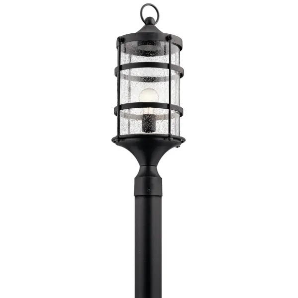 This vintage-inspired post mount lantern brings authentic early American charm to outdoor areas. The seeded glass and anvil iron finish create a timeless coastal or farmhouse aesthetic that works beautifully on posts, pillars, and pathways.