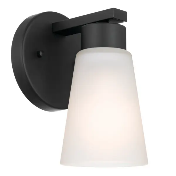 The Stamos wall sconce delivers contemporary style in a compact 5-inch profile. Its black steel frame and clear satin etched glass create soft, diffused light ideal for bathrooms and hallways. Dimmable capability adds flexibility.
