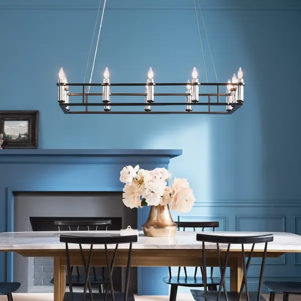 The Rosalind brings contemporary elegance with 12 candelabra lights arranged in a clean linear design. Its 45-inch length and black finish make it ideal for kitchen islands and dining tables, offering versatile style and ample illumination.
