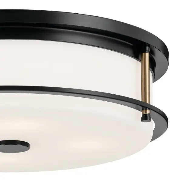 The Brit 4-light flush mount combines contemporary styling with practical functionality. Its 18-inch diameter and low 5.5-inch profile make it ideal for rooms with standard ceiling heights while providing ample illumination. - alternate view