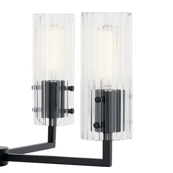 The Velestino 8-light chandelier makes a bold architectural statement with its impressive 40-inch diameter and sophisticated fluted glass shades. Perfect for large dining rooms and grand entryways, this fixture combines transitional elegance with contemporary clean lines. - alternate view
