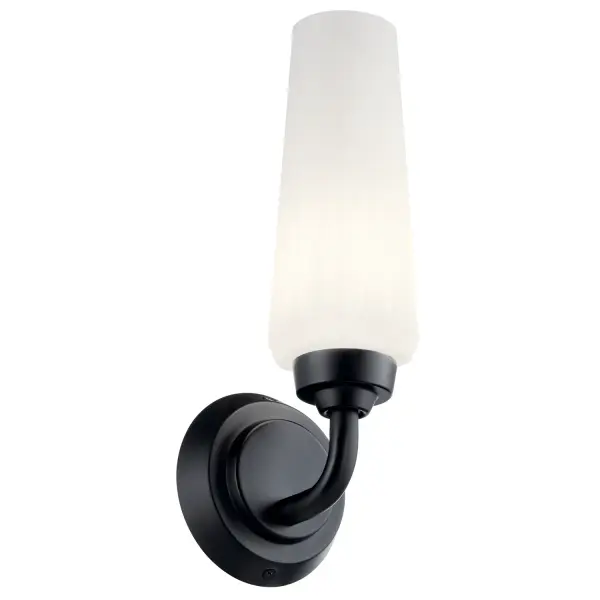 The Truby wall sconce combines aerodynamic-inspired design with classic opal glass for a versatile lighting solution. Its compact 4.5" width makes it ideal for tight spaces while the satin etched glass provides soft, diffused illumination.