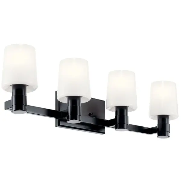 The Adani vanity light combines contemporary black finish with soft opal glass diffusers, providing even illumination across 30 inches. Dimmable and damp-rated for bathroom use, with flexible up or down mounting options.