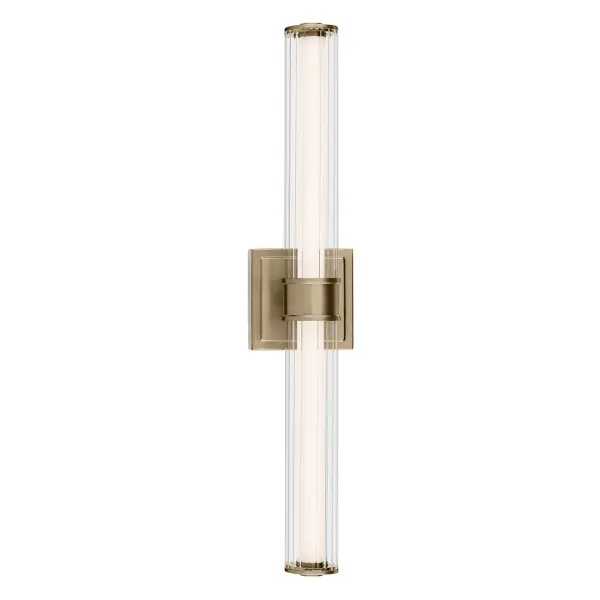 The Laurene vanity light combines contemporary design with timeless elegance through its clear fluted glass cylinder and warm Champagne Bronze finish. Energy-efficient integrated LED technology provides excellent illumination. - alternate view