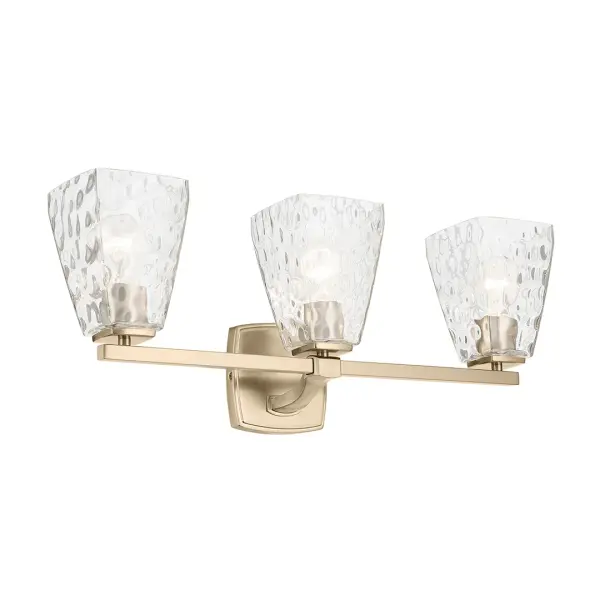 The Marant 3-Light Vanity Light combines sophisticated Champagne Bronze finish with clear water glass tapered shades, creating a refined look perfect for modern bathrooms. Dimmable and damp-rated for versatile installation.