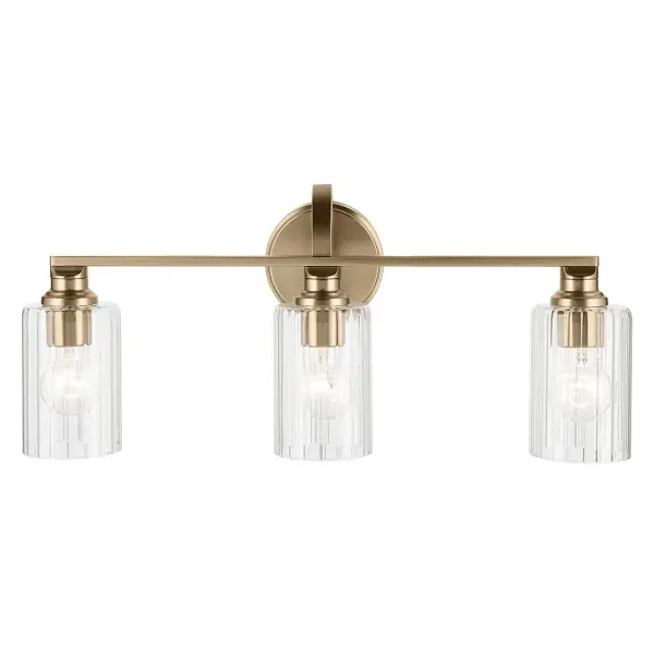 The Gioe 3-Light Vanity Light combines classic fluted glass cylinders with a sophisticated Champagne Bronze finish, creating a transitional design that works beautifully in both traditional and contemporary bathrooms. - alternate view