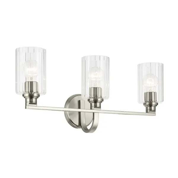 The Gioe 3-Light Vanity Light combines classic fluted glass cylinders with a clean brushed nickel finish, creating a versatile fixture that works in both traditional and contemporary bathrooms. Dimmable and damp-rated for bathroom use.