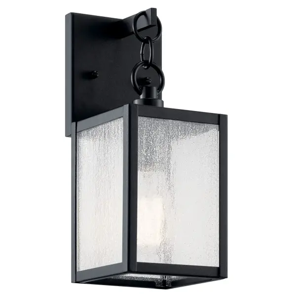 The Lahden outdoor wall sconce combines contemporary style with practical durability. Its unique chainlink design and clear seeded glass create ambient lighting perfect for modern outdoor spaces.
