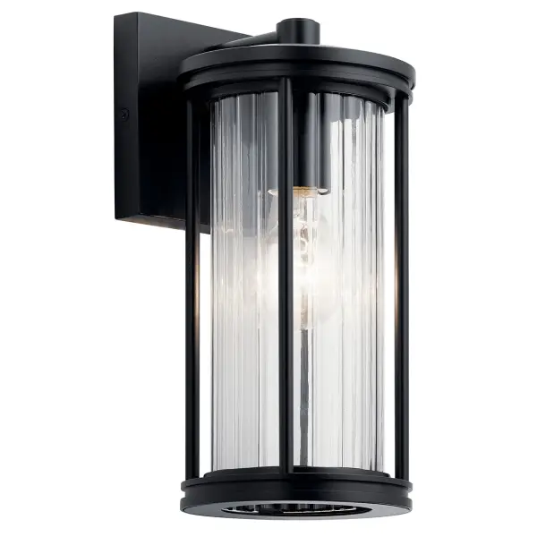 The Barras outdoor wall light combines contemporary styling with practical outdoor performance. Its Dark Sky compliant design minimizes light pollution while the clear ribbed glass adds textural interest to any exterior space.