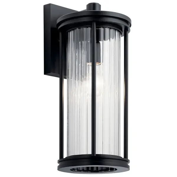 The Barras outdoor wall light combines contemporary design with practical outdoor lighting. Its dark sky compliant design minimizes light pollution while the clear ribbed glass adds visual texture and interest.