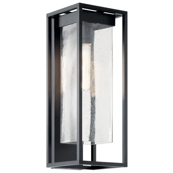 The Mercer 24" wall light transforms exterior walls into sculptural focal points with its oversized rectangular cage and floating seeded glass shade. Built from weather-resistant Climates material to withstand saltwater and UV exposure.