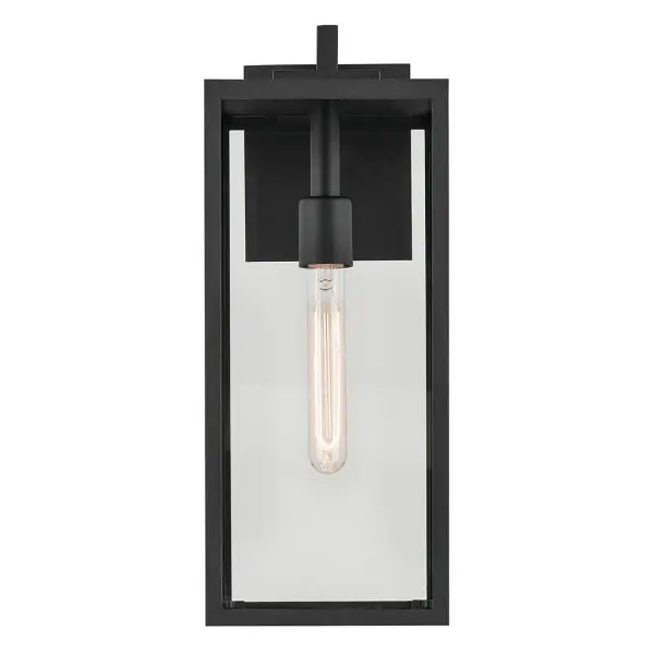The Branner outdoor wall light combines transitional styling with industrial touches, featuring a textured black finish and clear glass shade. Wet-rated for full weather exposure, this medium-sized fixture works beautifully on porches, patios, and entryways. - alternate view
