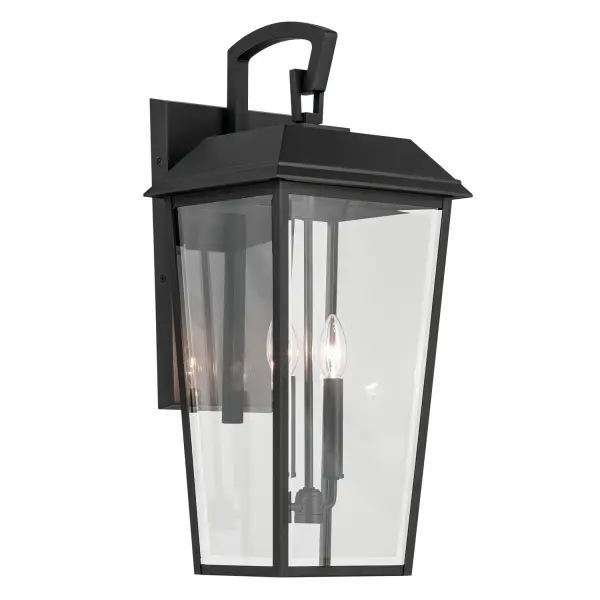 The Mathus outdoor wall sconce combines traditional elegance with modern durability. Its textured black aluminum frame and beveled glass panes create sophisticated curb appeal while the wet-rated design ensures reliable performance.