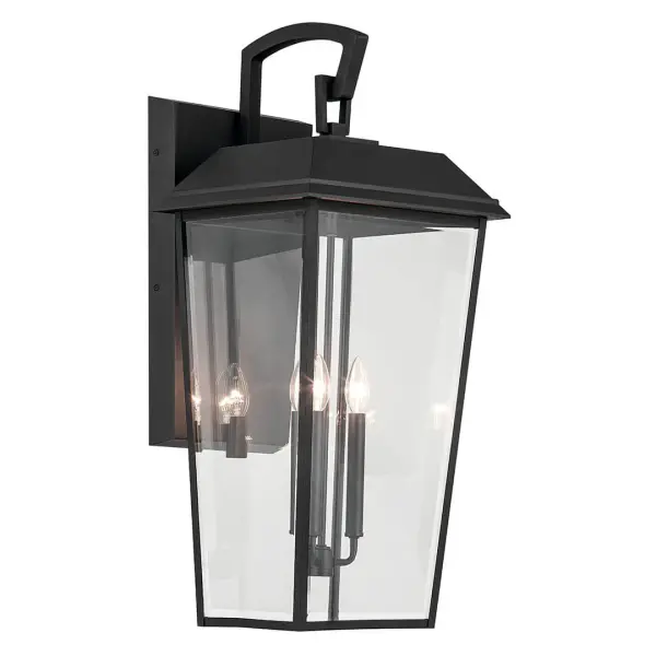 The Mathus 3-light outdoor wall sconce combines classic design with durable wet-rated construction. Its textured black finish and clear beveled glass panels create sophisticated illumination for entryways and outdoor living spaces.