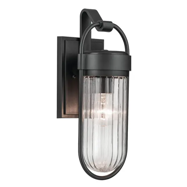 The Brix outdoor wall light combines contemporary design with industrial styling in a compact 16-inch fixture. Featuring clear glass and textured black finish, it's wet-rated for full weather exposure.