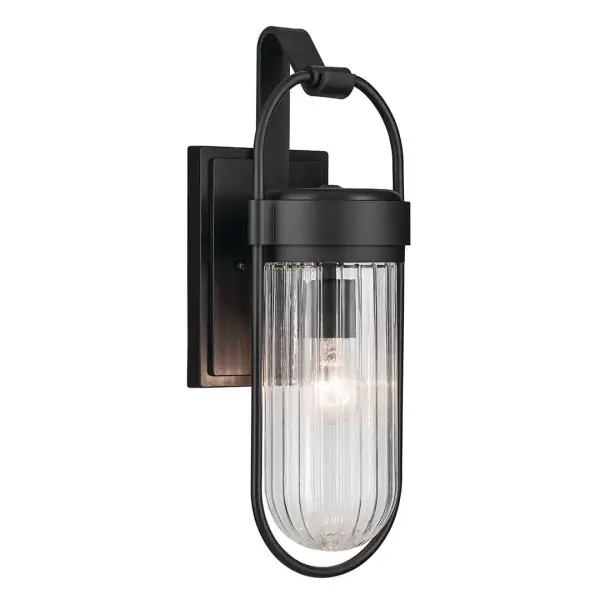 The Brix outdoor wall light combines contemporary design with industrial styling in a durable textured black finish. Featuring clear glass and wet-rated construction, it's built for exposed outdoor conditions.