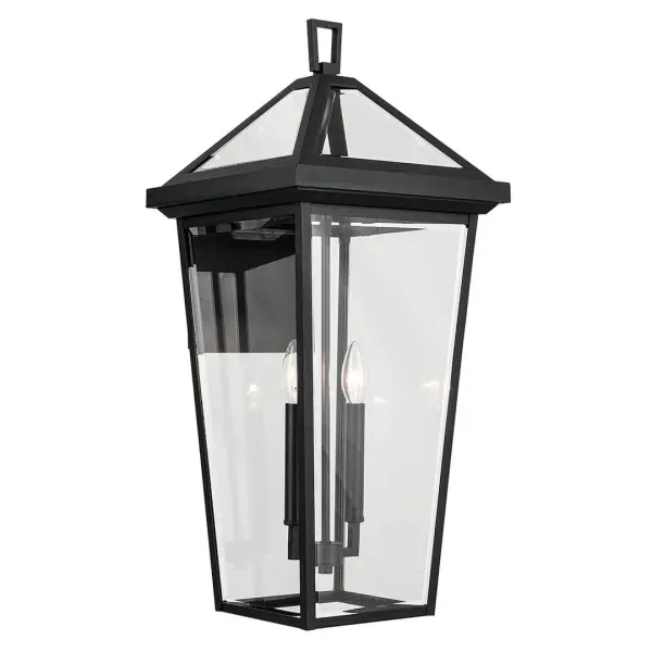 The Regence outdoor wall light brings Old World elegance to exterior spaces with its textured black finish and clear beveled glass panels. At 26 inches tall, this substantial 2-light fixture makes a statement on larger homes.
