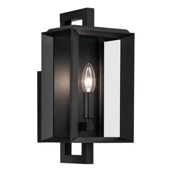 The Kroft outdoor wall sconce combines practical weather protection with modern design. Its corner channel system keeps water out while thick clear glass panes create a clean, architectural look perfect for contemporary exteriors.