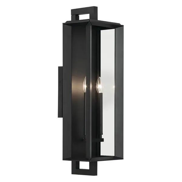 The Kroft Outdoor Wall Light makes a dramatic statement with its 28-inch height and textured black finish. Featuring clear glass and wet-rated durability, this 2-light fixture combines modern industrial design with reliable outdoor performance.
