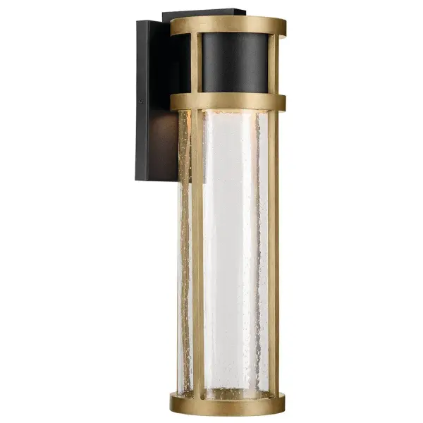 The Camillo combines contemporary design with practical outdoor durability. Its textured black and brass finish paired with seeded glass creates visual interest while integrated LED technology ensures energy efficiency.